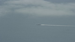 AX0159_241E - 7.6K aerial stock footage tracking a ferry in open waters, Southern California