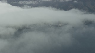 7.6K aerial stock footage of low clouds over Catalina Island, California Aerial Stock Footage | AX0159_247E