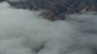 7.6K aerial stock footage of low clouds over Avalon, Catalina Island, California Aerial Stock Footage | AX0159_249