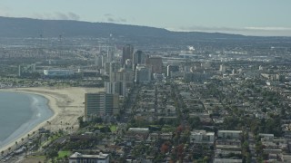 AX0160_060 - 7.6K aerial stock footage of office high-rises in Downtown Long Beach, California