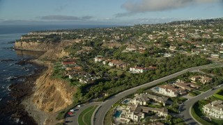 AX0161_028E - 7.6K aerial stock footage flying over clifftop mansions in Rancho Palos Verdes, California