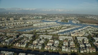 7.6K aerial stock footage of waterfront apartment buildings overlooking marinas in Marina Del Rey, California Aerial Stock Footage | AX0161_053