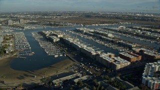 7.6K aerial stock footage of waterfront apartment buildings overlooking marinas, Marina Del Rey, California Aerial Stock Footage | AX0161_054E