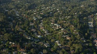 7.6K aerial stock footage passing upscale, tree-lined neighborhoods in Brentwood, California Aerial Stock Footage | AX0161_087