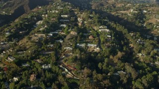 AX0161_099 - 7.6K aerial stock footage of spacious hillside mansions in Beverly Hills, California