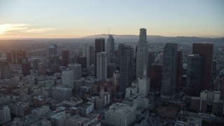 7.6K aerial stock footage approaching Gas Company Tower and US Bank Tower at twilight in Downtown Los Angeles, California Aerial Stock Footage | AX0162_089