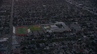 7.6K aerial stock footage of John Burroughs High School at twilight in Burbank, California Aerial Stock Footage | AX0162_111E