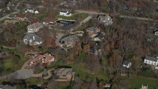 4K aerial stock footage of flying by large, upscale homes in Burr Ridge, Illinois Aerial Stock Footage | AX0165_0007