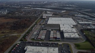 4K aerial stock footage approach and pass warehouse buildings in Hodgkins, Illinois Aerial Stock Footage | AX0165_0010