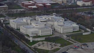 4K aerial stock footage of circling the Cook County Jail in West Side Chicago, Illinois skyline Aerial Stock Footage | AX0165_0018