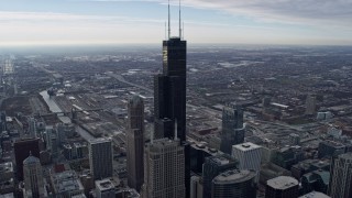 4K aerial stock footage of approaching and flying over Willis Tower in Downtown Chicago, Illinois Aerial Stock Footage | AX0165_0059