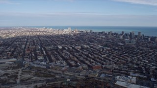 AX0166_0006 - 4K aerial stock footage of approaching urban neighborhoods in North Side Chicago, Illinois