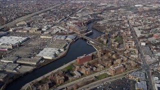 AX0166_0009 - 4K aerial stock footage of flying over apartment complexes by the Chicago River in North Side Chicago, Illinois