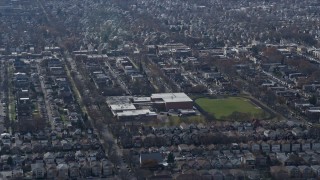 4K aerial stock footage of flying past a military high school in Northwest Side Chicago, Illinois Aerial Stock Footage | AX0166_0014