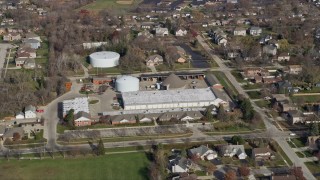 4K aerial stock footage of approaching Palatine Public Works Department building in Palatine, Illinois Aerial Stock Footage | AX0166_0028