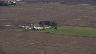 4K aerial stock footage of a barn, silo and farmhouse in Union Grove, Wisconsin Aerial Stock Footage | AX0166_0055