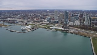 4K aerial stock footage of reverse view of skyscrapers and lakefront museums in Milwaukee, Wisconsin Aerial Stock Footage | AX0166_0077