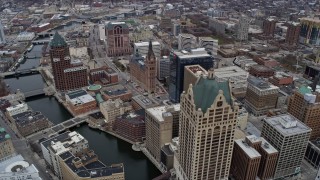 4K aerial stock footage of flying by office tower and city hall in Milwaukee, Wisconsin Aerial Stock Footage | AX0166_0082