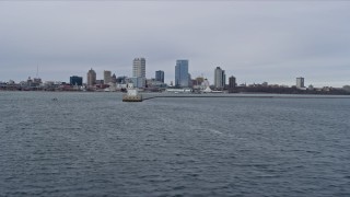 4K aerial stock footage of approaching the city's skyline and the lighthouse, Milwaukee, Wisconsin Aerial Stock Footage | AX0167_0012