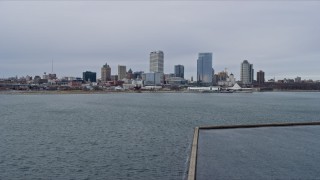 4K aerial stock footage of approaching the city's skyline from the lighthouse, Milwaukee, Wisconsin Aerial Stock Footage | AX0167_0013