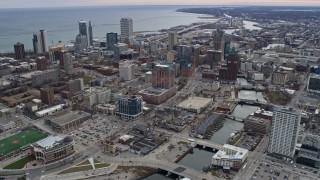 4K aerial stock footage of skyscrapers and office buildings seen from city hall and river in downtown, Milwaukee, Wisconsin Aerial Stock Footage | AX0167_0024