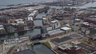 4K aerial stock footage of riverfront office buildings by the Milwaukee River, Milwaukee, Wisconsin Aerial Stock Footage | AX0167_0027