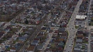 4K aerial stock footage of flying by an urban residential neighborhood, Milwaukee, Wisconsin Aerial Stock Footage | AX0167_0030