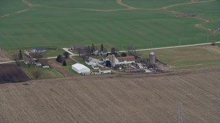 4K aerial stock footage of silos at a farm in Franksville, Wisconsin Aerial Stock Footage | AX0167_0043