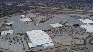 4K aerial stock footage of flying by the Gurnee Mills shopping mall in Gurnee, Illinois Aerial Stock Footage | AX0167_0053