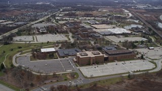 AX0167_0058 - 4K aerial stock footage of flying over Abbott Laboratories office complex in Abbott Park, Illinois