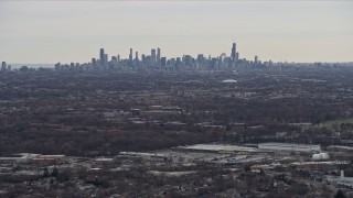 4K aerial stock footage of the Downtown Chicago skyline seen from Northwest Side Chicago, Illinois Aerial Stock Footage | AX0167_0074