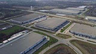 4K aerial stock footage approach and fly over warehouse buildings in Lockport, Illinois Aerial Stock Footage | AX0168_0027