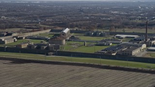 4K aerial stock footage of flying by the Stateville Correctional Center prison in Crest Hill, Illinois Aerial Stock Footage | AX0168_0036