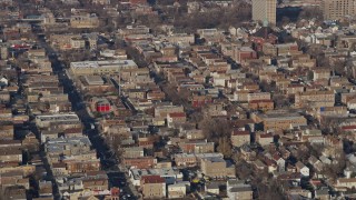 4K aerial stock footage of flying past an urban neighborhood in West Side Chicago, Illinois Aerial Stock Footage | AX0169_0019