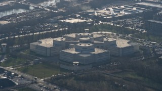 4K aerial stock footage of flying away from the Cook County Jail in West Side Chicago, Illinois Aerial Stock Footage | AX0169_0021