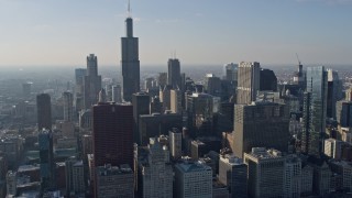 4K aerial stock footage fly past Willis Tower and nearby skyscrapers, Downtown Chicago, Illinois Aerial Stock Footage | AX0169_0044