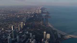 4K aerial stock footage of approaching the Lincoln Park Zoo from Downtown Chicago, Illinois Aerial Stock Footage | AX0169_0089