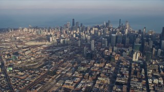 4K aerial stock footage of a wide view of Downtown Chicago, Illinois, seen from high over the West Side Aerial Stock Footage | AX0169_0097