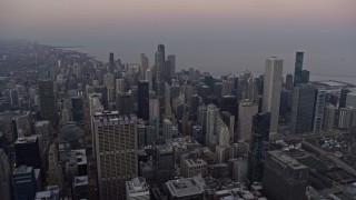 4K aerial stock footage of downtown's tall skyscrapers at sunset, Downtown Chicago, Illinois Aerial Stock Footage | AX0170_0035