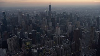 4K aerial stock footage approach and fly over downtown at sunset, Downtown Chicago, Illinois Aerial Stock Footage | AX0170_0043