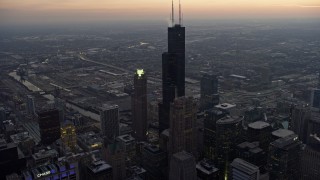 4K aerial stock footage fly over Trump Tower to approach Willis Tower and West Side at sunset, Downtown Chicago, Illinois Aerial Stock Footage | AX0170_0044