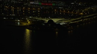 4K aerial stock footage of Adler Planetarium at night, Chicago, Illinois Aerial Stock Footage | AX0170_0095