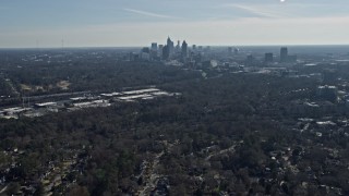 6.7K aerial stock footage tilt from homes to reveal Midtown Atlanta skyline, Atlanta, Georgia Aerial Stock Footage | AX0171_0034