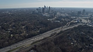 6.7K aerial stock footage tilt from warehouse buildings to reveal Midtown Atlanta skyline, Georgia Aerial Stock Footage | AX0171_0035