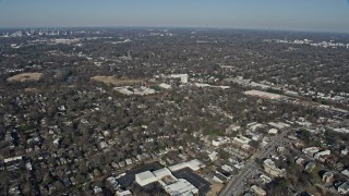 6.7K aerial stock footage of approaching homes, a high school and football field in Atlanta, Georgia Aerial Stock Footage | AX0171_0045