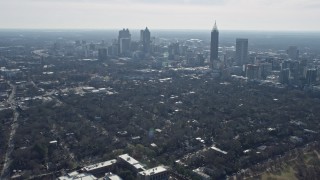 6.7K aerial stock footage tilt from high school to reveal skyscrapers in Midtown Atlanta, Georgia Aerial Stock Footage | AX0171_0047