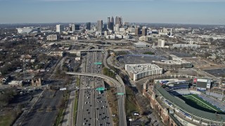 6.7K aerial stock footage follow freeway with heavy traffic toward the Downtown Atlanta skyline, Georgia Aerial Stock Footage | AX0171_0072