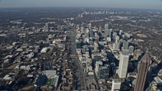 6.7K aerial stock footage following the freeway past Midtown Atlanta toward Buckhead, Georgia Aerial Stock Footage | AX0171_0094