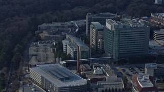 6.7K aerial stock footage a reverse view of the Centers for Disease Control and Prevention in Atlanta, Georgia Aerial Stock Footage | AX0171_0126