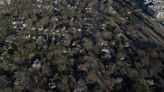 6.7K aerial stock footage following a road through a suburban neighborhood in Decatur, Georgia Aerial Stock Footage | AX0171_0128